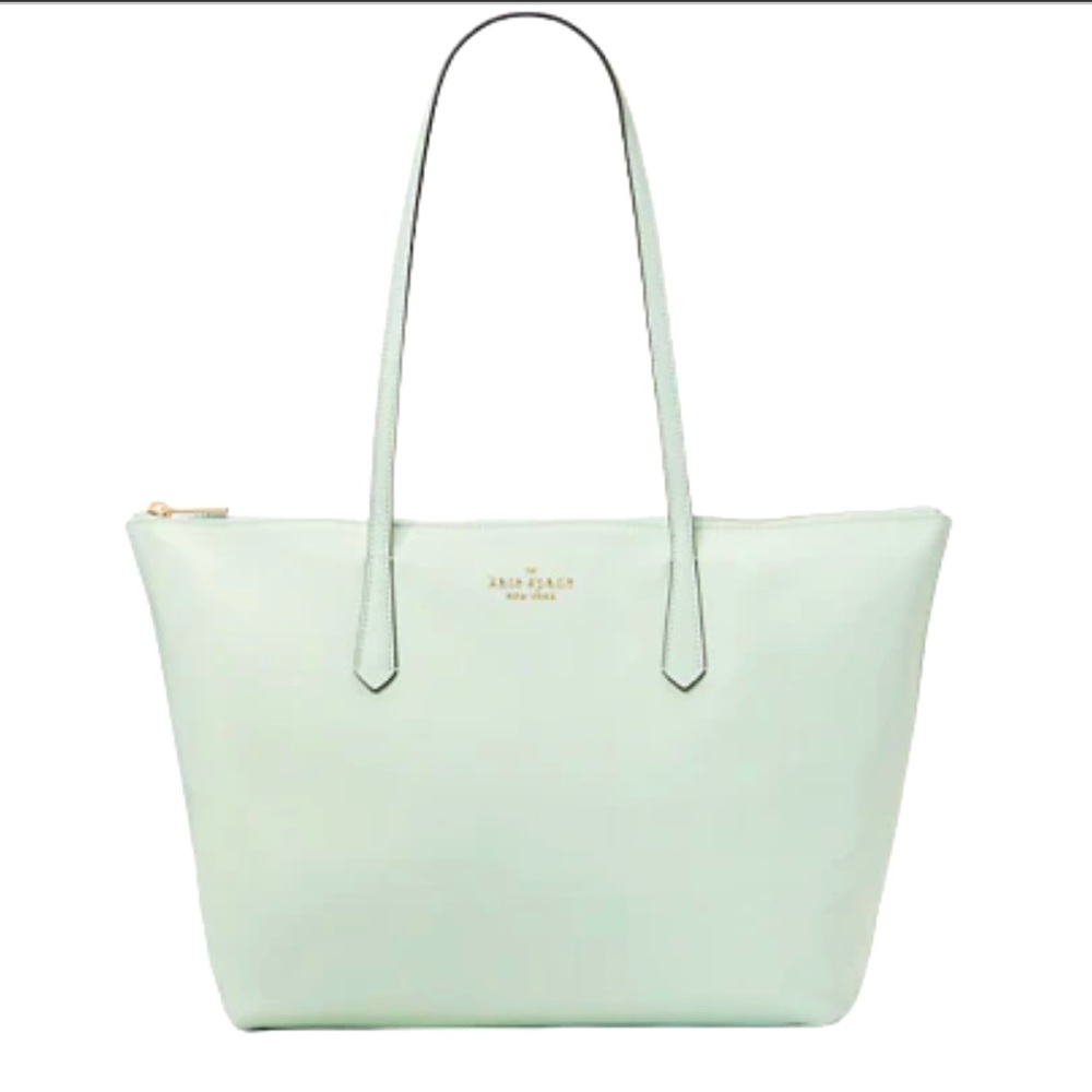 Kate Spade New York
Kitt the little better nylon large tote.  Color-crystal blue
